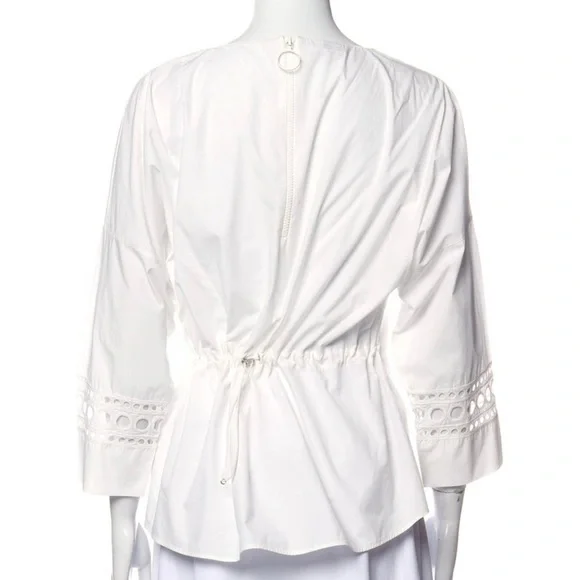 Akris Punto Blouse
Three-Quarter Sleeve/Bateau Neckline
Exposed Zip Closure back - Picture 3 of 3